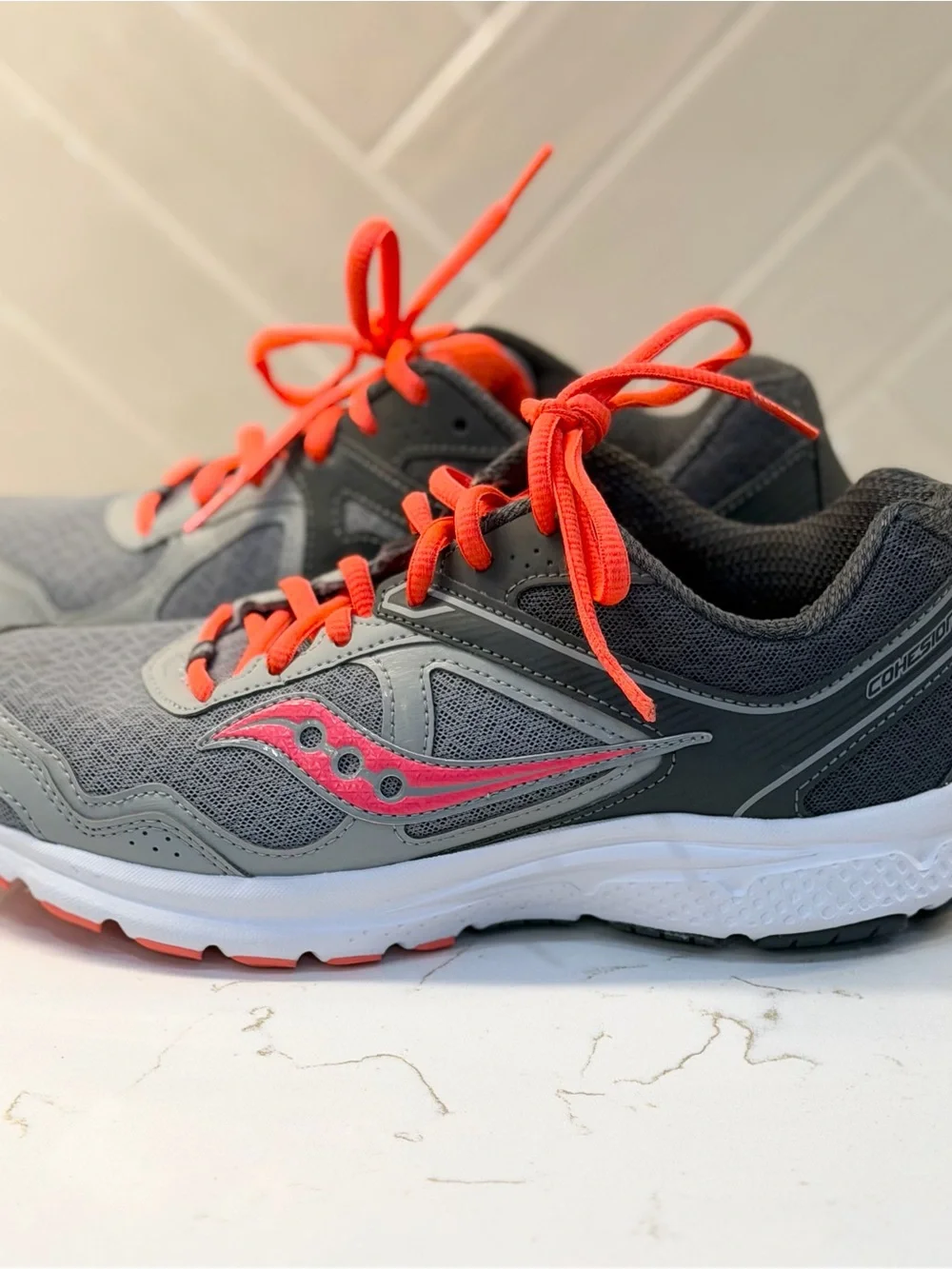 Saucony Women’s Gray Sneakers with Pink Logo and Orange Laces size 9.5